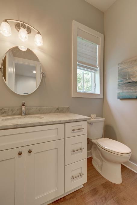 10 Sea Grade Road Santa Rosa Beach, FL 32459 - Photo 26 of 51 a bathroom with a toilet sink and mirror
