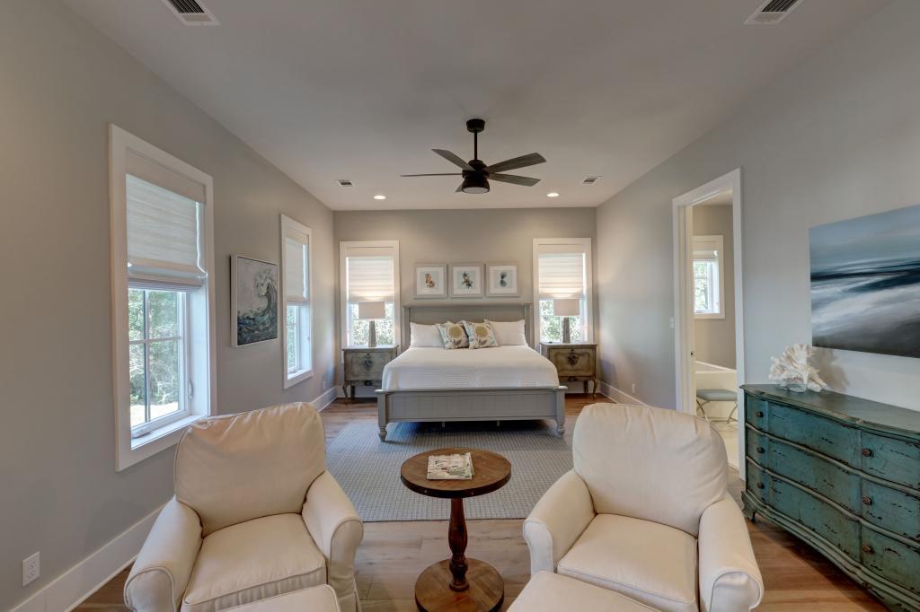 10 Sea Grade Road Santa Rosa Beach, FL 32459 - Photo 29 of 51 a living room with furniture and a chandelier