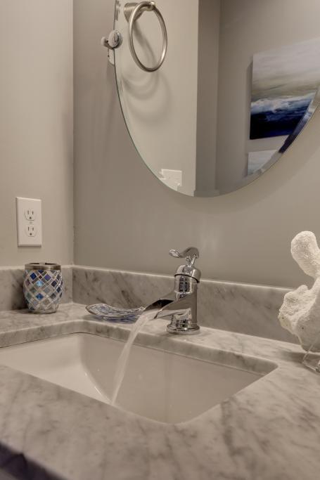 10 Sea Grade Road Santa Rosa Beach, FL 32459 - Photo 32 of 51 a bathroom with a sink and a mirror