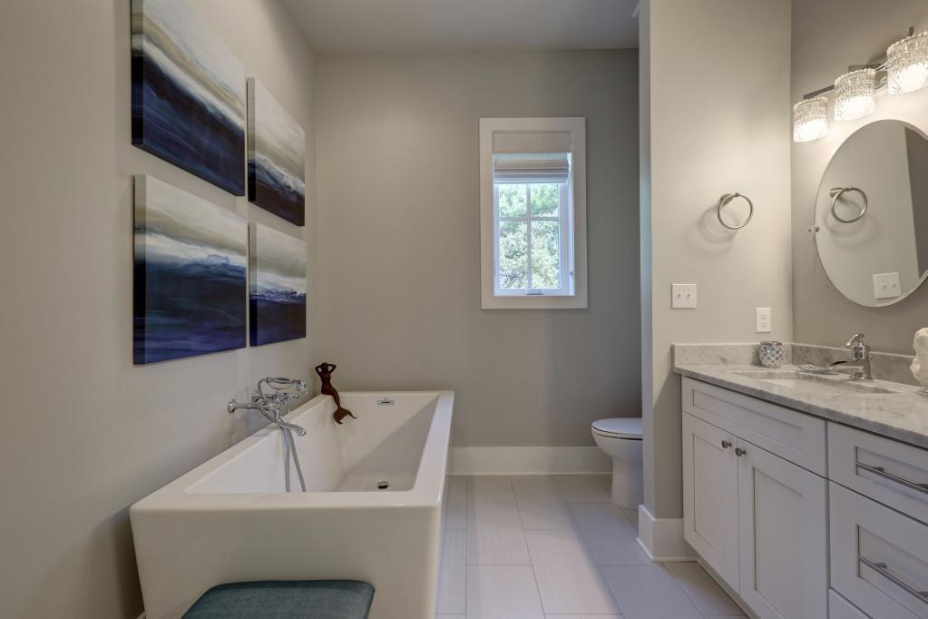 10 Sea Grade Road Santa Rosa Beach, FL 32459 - Photo 33 of 51 a bathroom with a toilet sink and mirror