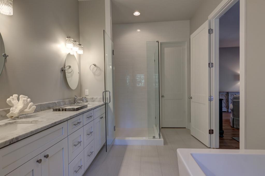 10 Sea Grade Road Santa Rosa Beach, FL 32459 - Photo 34 of 51 a spacious bathroom with a granite countertop sink mirror and shower