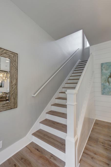 10 Sea Grade Road Santa Rosa Beach, FL 32459 - Photo 36 of 51 a view of staircase with wooden floor and white walls