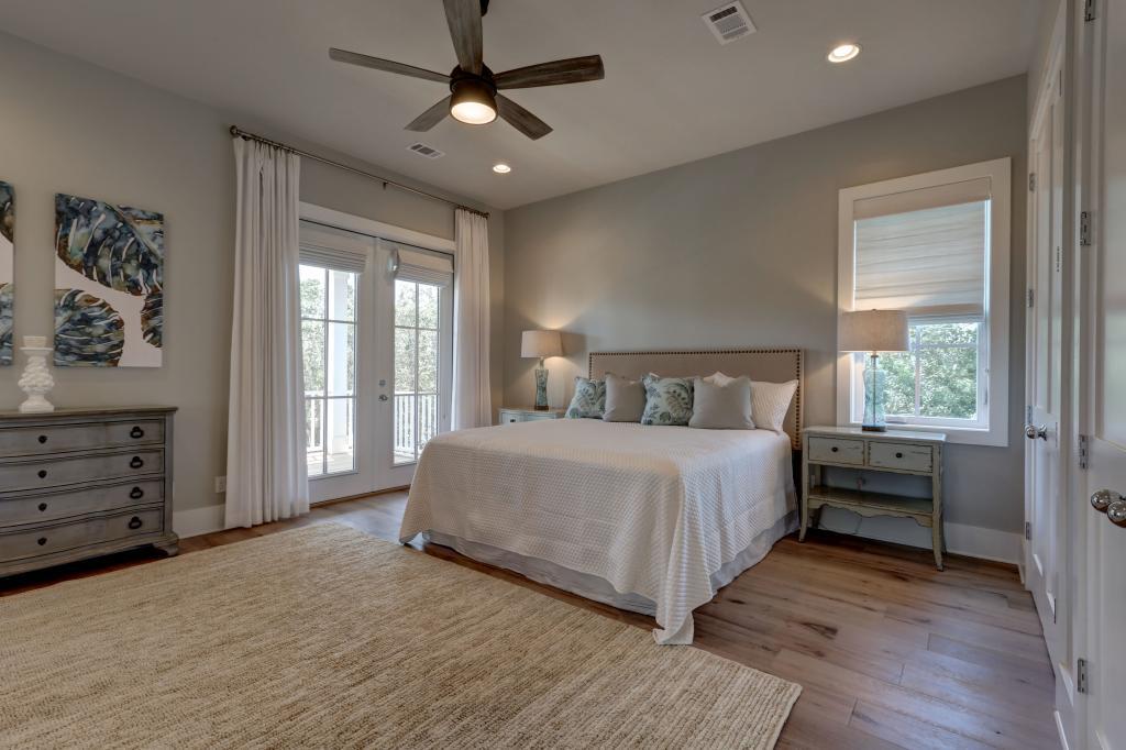 10 Sea Grade Road Santa Rosa Beach, FL 32459 - Photo 38 of 51 a bedroom with a large bed and a window