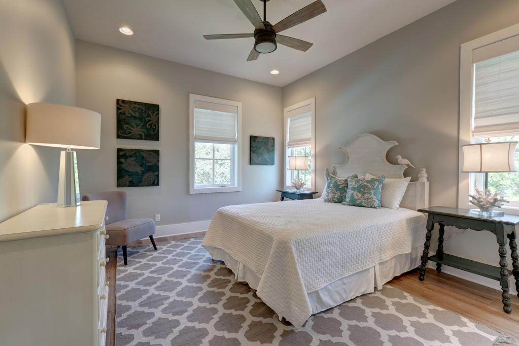 10 Sea Grade Road Santa Rosa Beach, FL 32459 - Photo 46 of 51 a bedroom with a bed mirror and window
