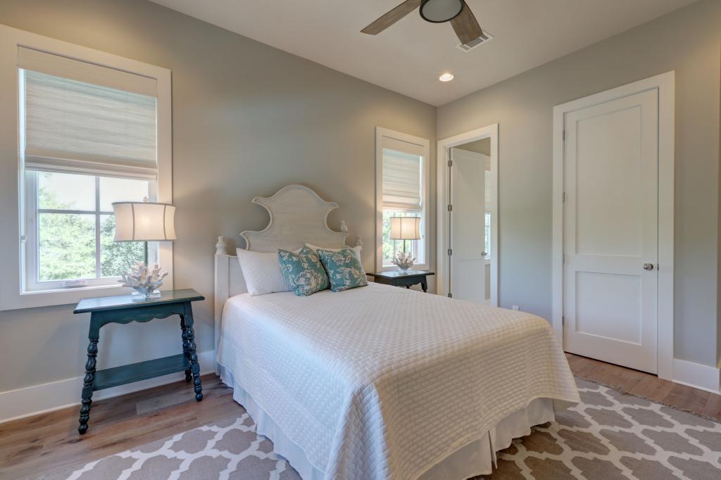 10 Sea Grade Road Santa Rosa Beach, FL 32459 - Photo 47 of 51 a bedroom with a bed and a window