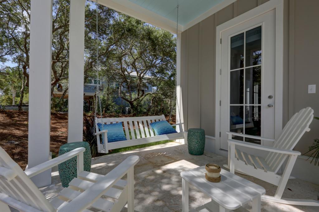 10 Sea Grade Road Santa Rosa Beach, FL 32459 - Photo 10 of 51 a view of a bench in back yard of the house
