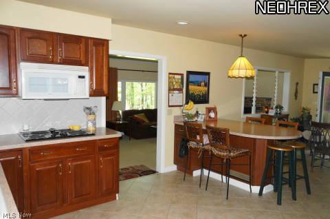 4542 Edson Road Kent, OH 44240 - Photo 7 of 25 Walk into the great room from the kitchen.