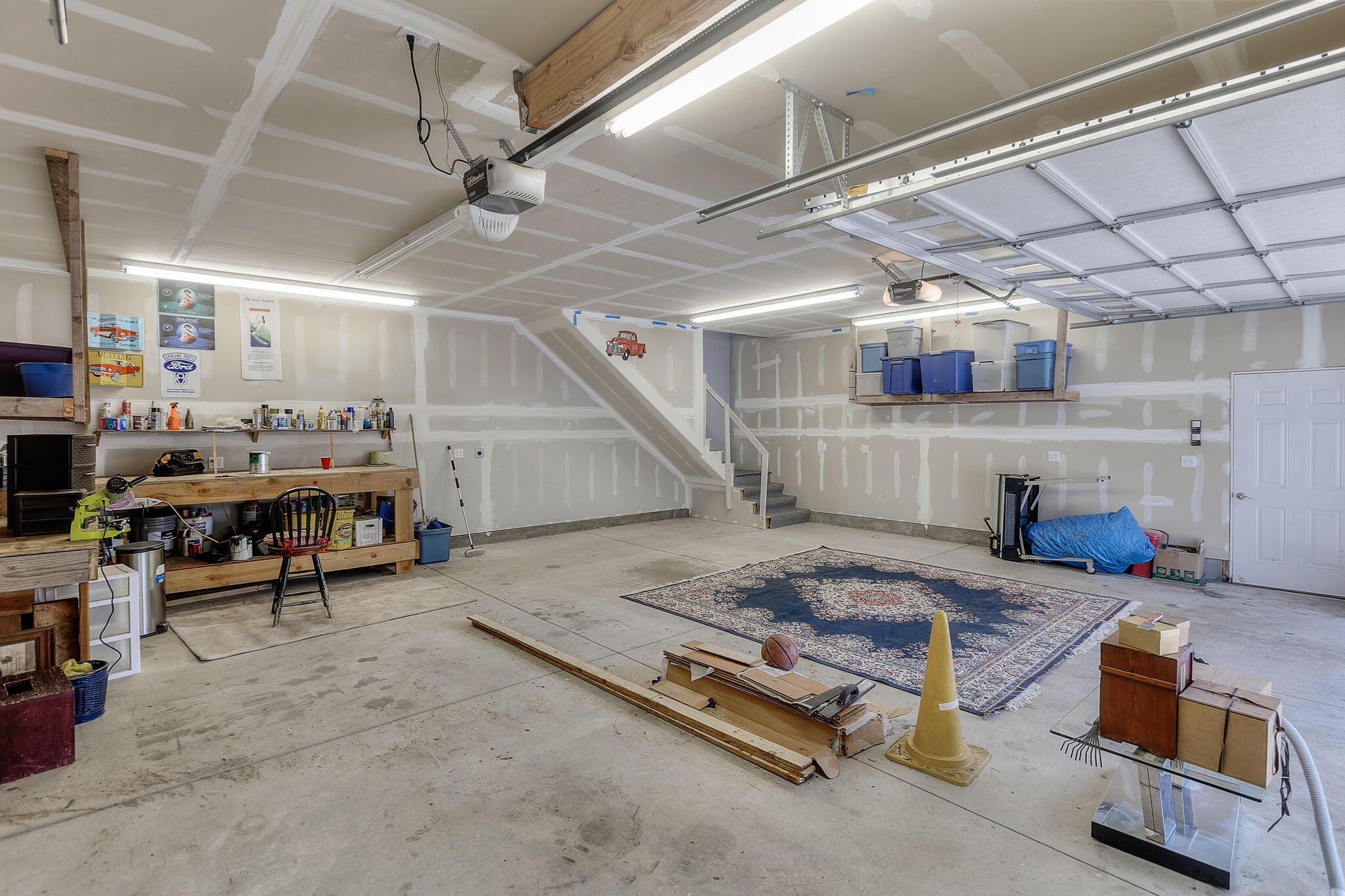 59842 Navajo Road Bend, OR 97702 - Photo 43 of 52 a gym room with lots of furniture and clutter