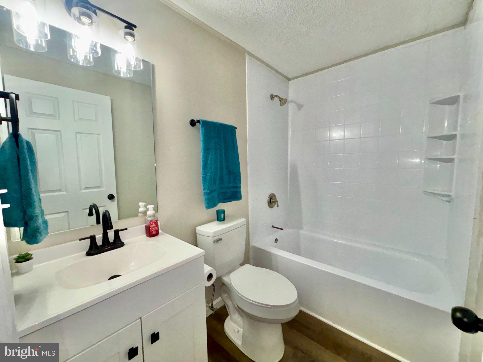 12995 Rousby Hall Road Lusby, MD 20657 - Photo 8 of 16 Modern bathroom with stylish accents.