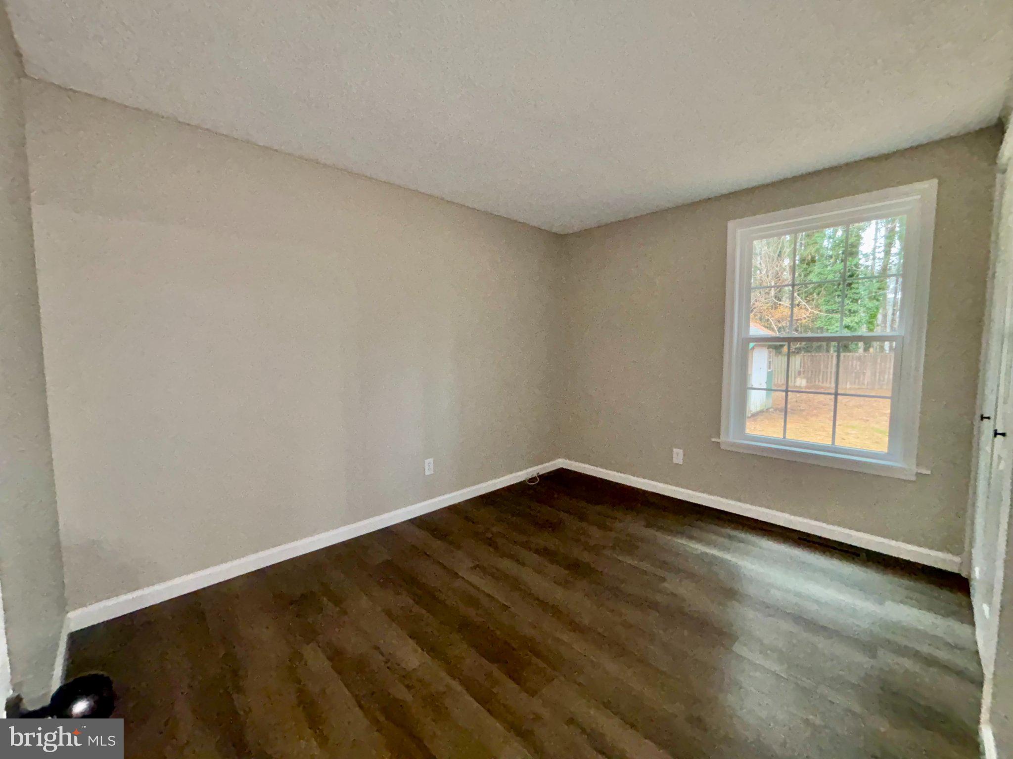 12995 Rousby Hall Road Lusby, MD 20657 - Photo 10 of 16 Bright and airy blank canvas room.