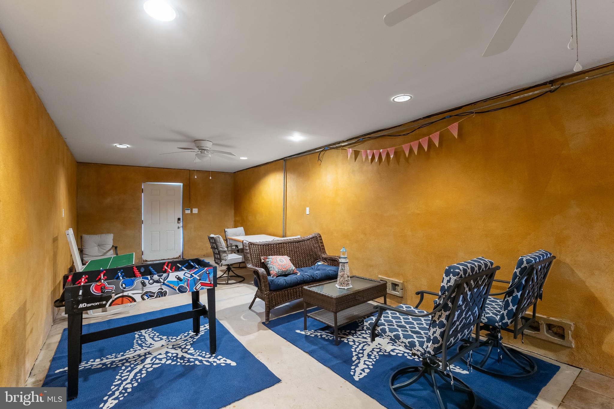 209 O Avenue Wildwood, NJ 08260 - Photo 14 of 17 a living room with furniture and a flat screen tv