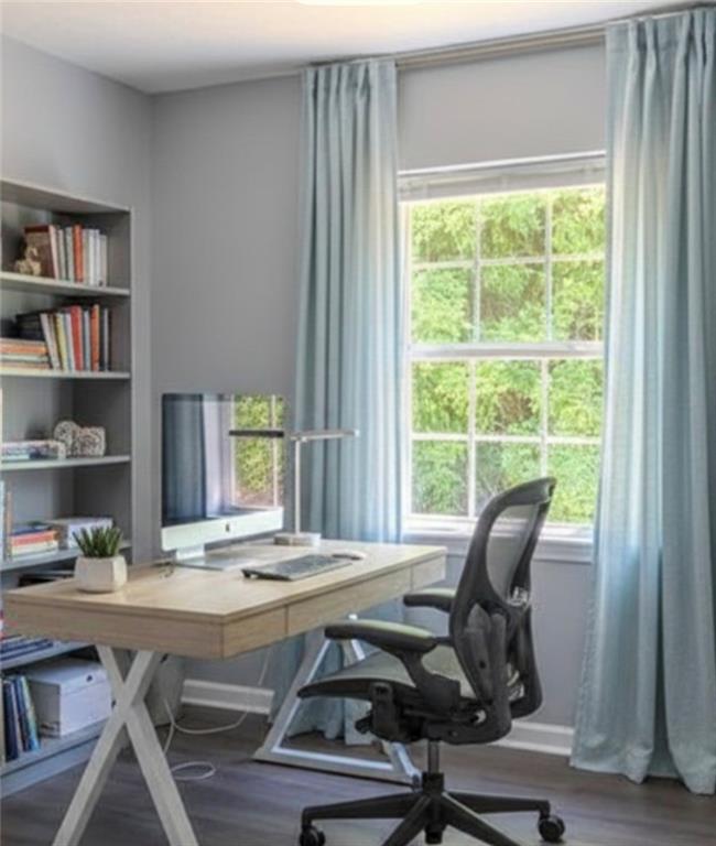 53 Washington Drive Forsyth, GA 31029 - Photo 16 of 19 a view of a workspace with furniture and a window