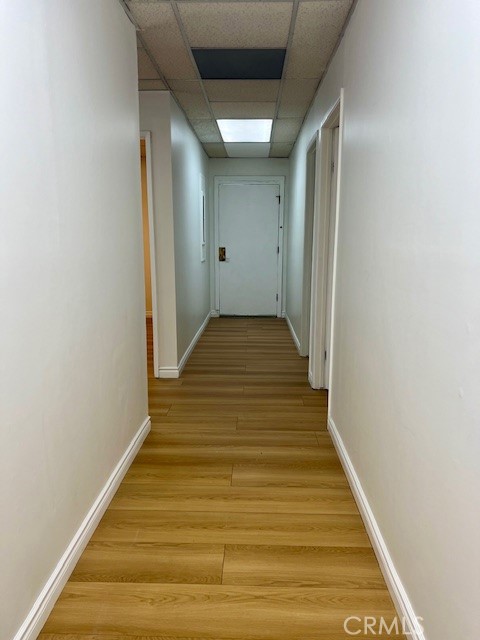 8205 Hellman Avenue Rosemead, CA 91770 - Photo 8 of 11 a view of a hallway with wooden floor
