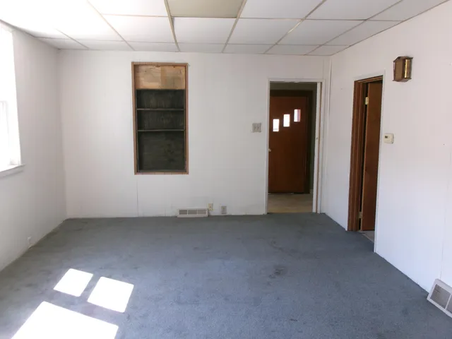 an empty room with windows