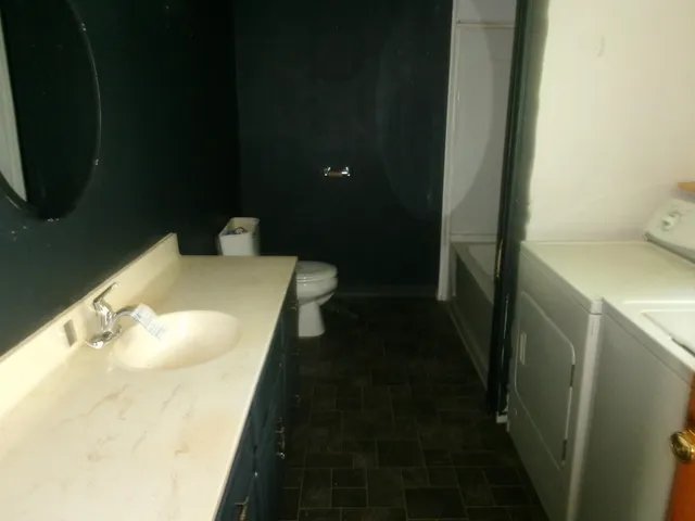 a bathroom with a sink and a toilet