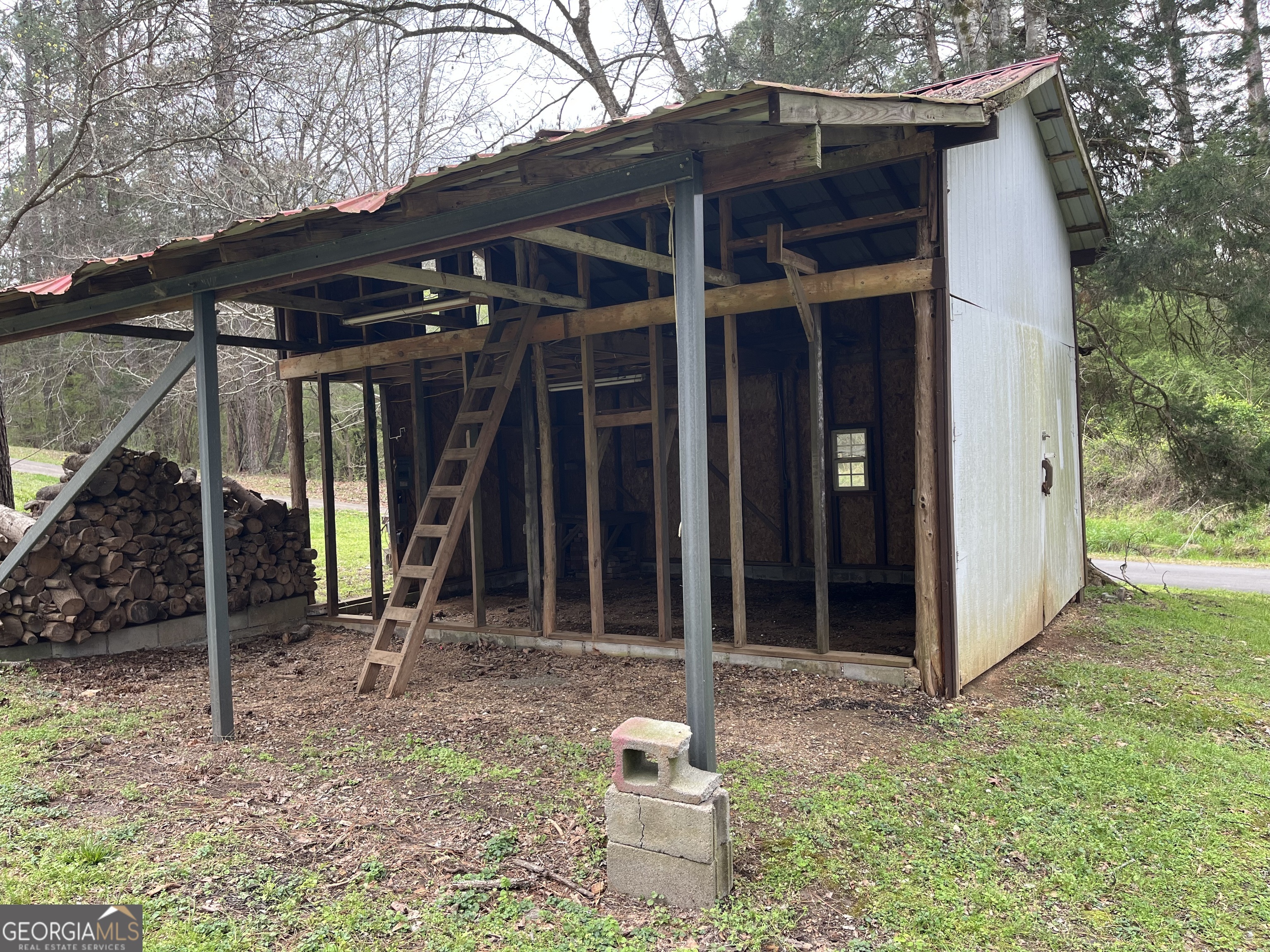 475 Davis Road Southwest Cave Spring, GA 30124 - Photo 5 of 27 a view of a small house