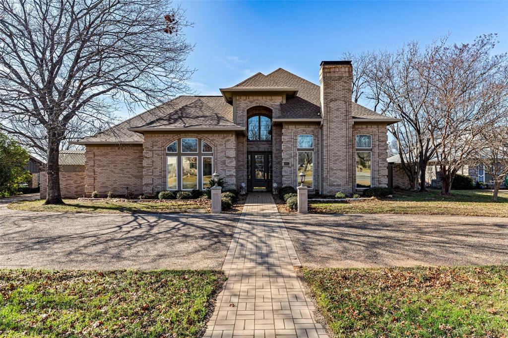 8908 Brierfield Road Granbury, TX 76049 - Photo 1 of 40 a front view of a house with yard
