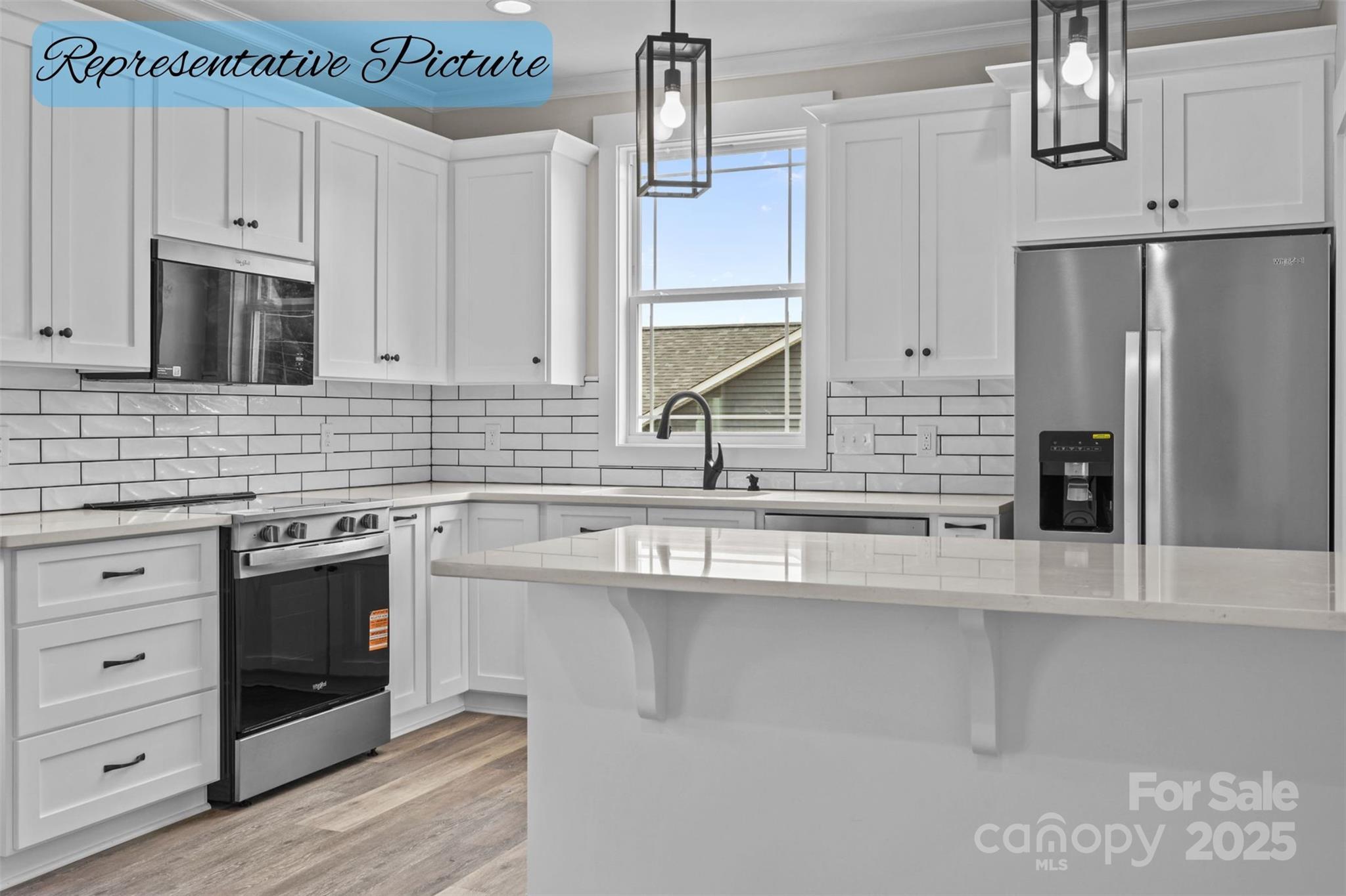 36220 Gene Road New London, NC 28127 - Photo 13 of 42 a kitchen with stainless steel appliances a sink stove and refrigerator