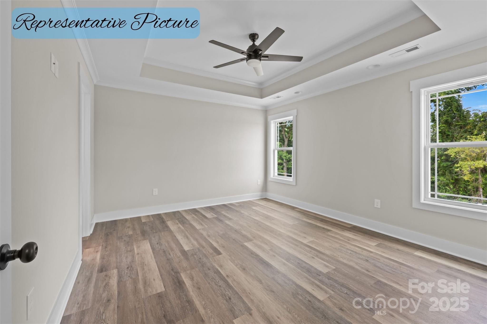 36220 Gene Road New London, NC 28127 - Photo 32 of 42 wooden floor in an empty room with a window