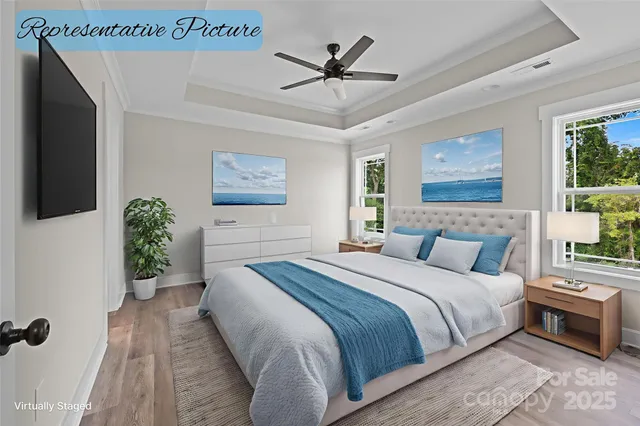 a bedroom with a bed dresser and a window