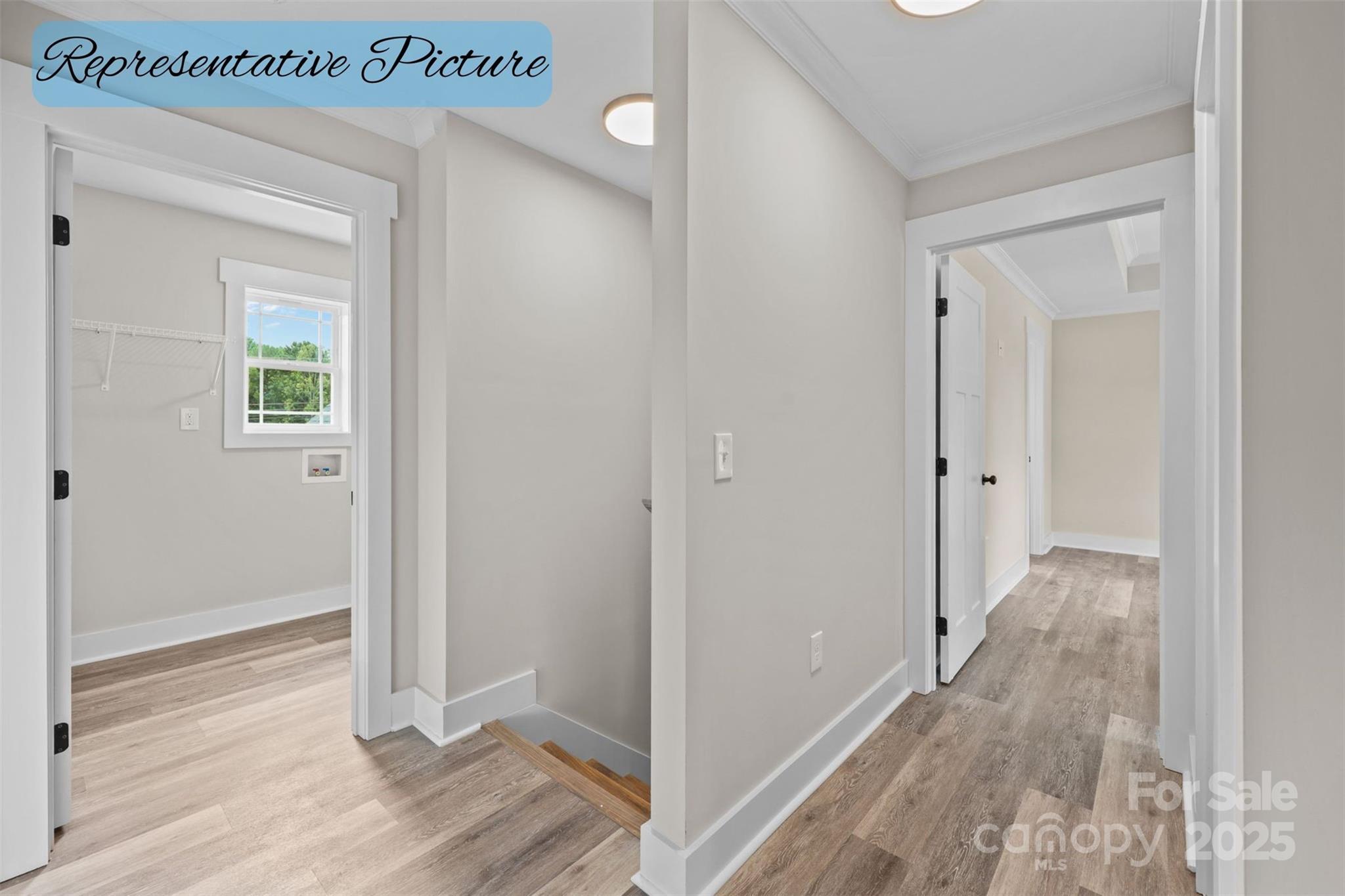 36220 Gene Road New London, NC 28127 - Photo 36 of 42 a view of a hallway with wooden floor