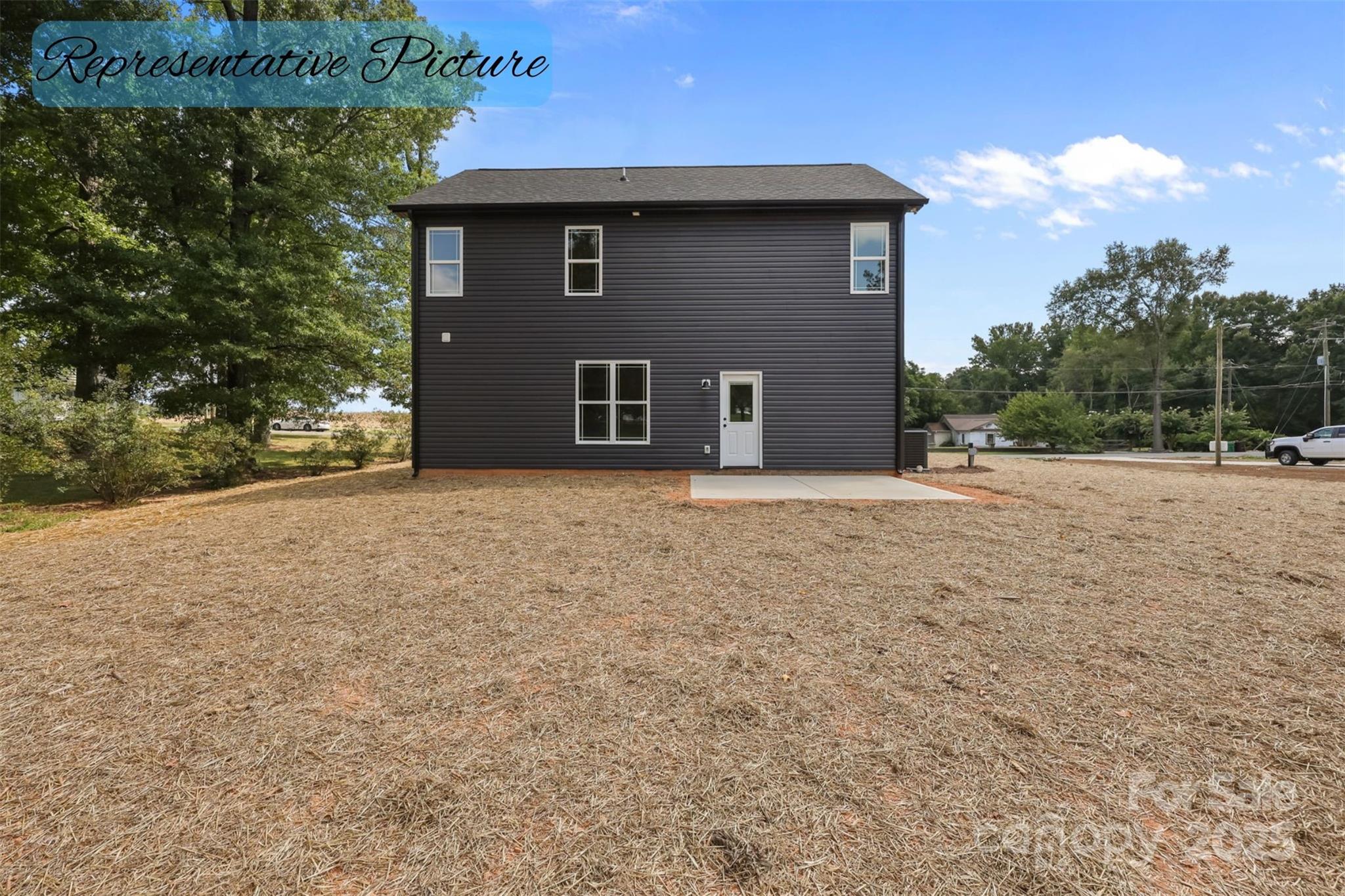 36220 Gene Road New London, NC 28127 - Photo 41 of 42 a house that has a tree in front of it