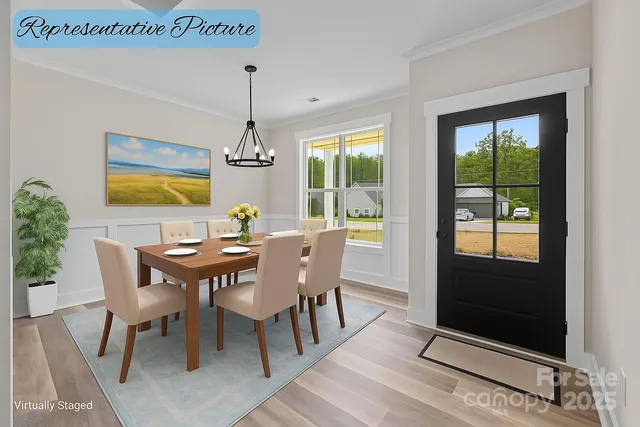 a dining room with furniture window wooden floor