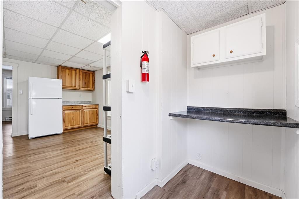 316 Mitchell Avenue Butler, PA 16001 - Photo 13 of 20 a view of a kitchen with wooden floor