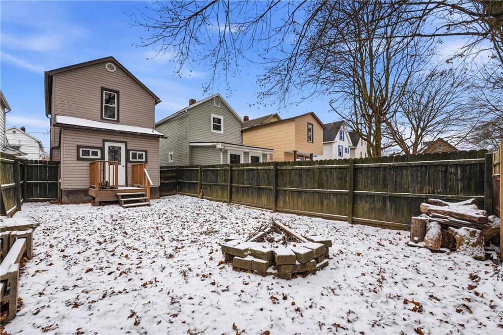 316 Mitchell Avenue Butler, PA 16001 - Photo 3 of 20 a wooden bench sitting in front of a house