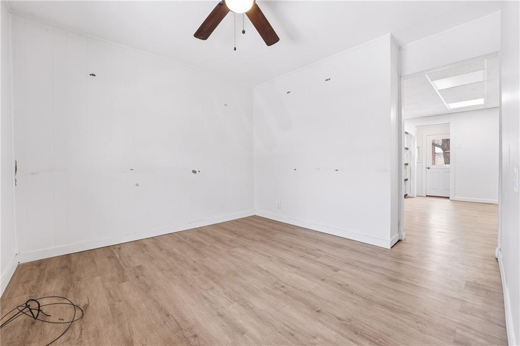 316 Mitchell Avenue Butler, PA 16001 - Photo 5 of 20 a view of a room with wooden floor and white walls