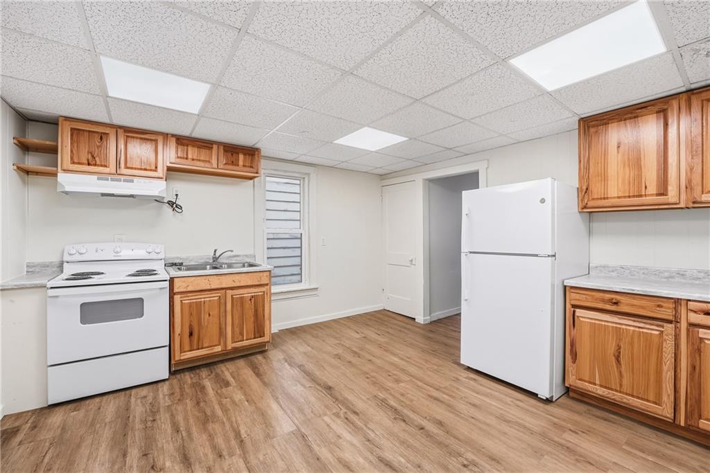 316 Mitchell Avenue Butler, PA 16001 - Photo 8 of 20 a kitchen with stainless steel appliances granite countertop a refrigerator a stove a sink and a microwave