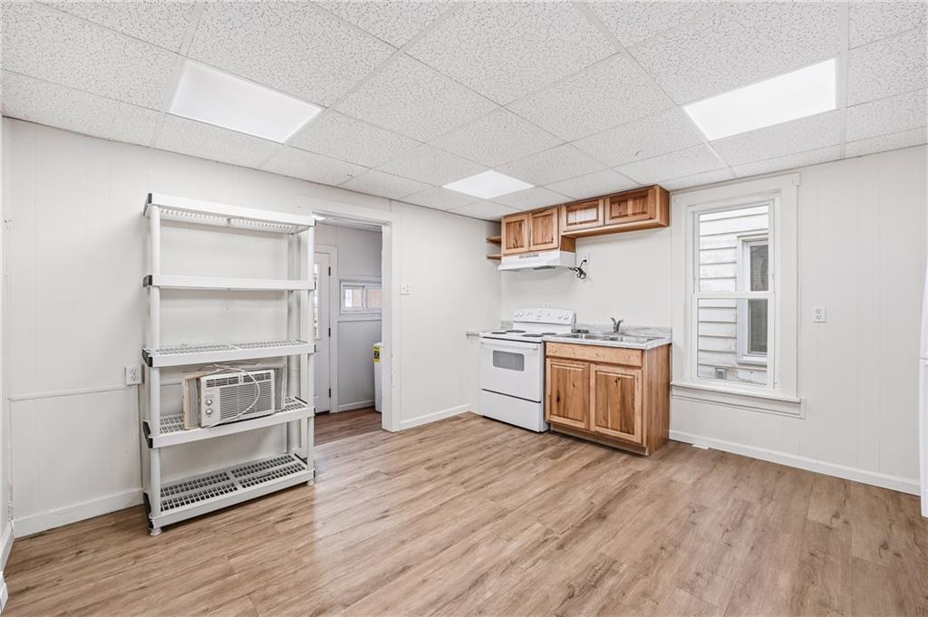 316 Mitchell Avenue Butler, PA 16001 - Photo 9 of 20 a kitchen with a refrigerator and white cabinets