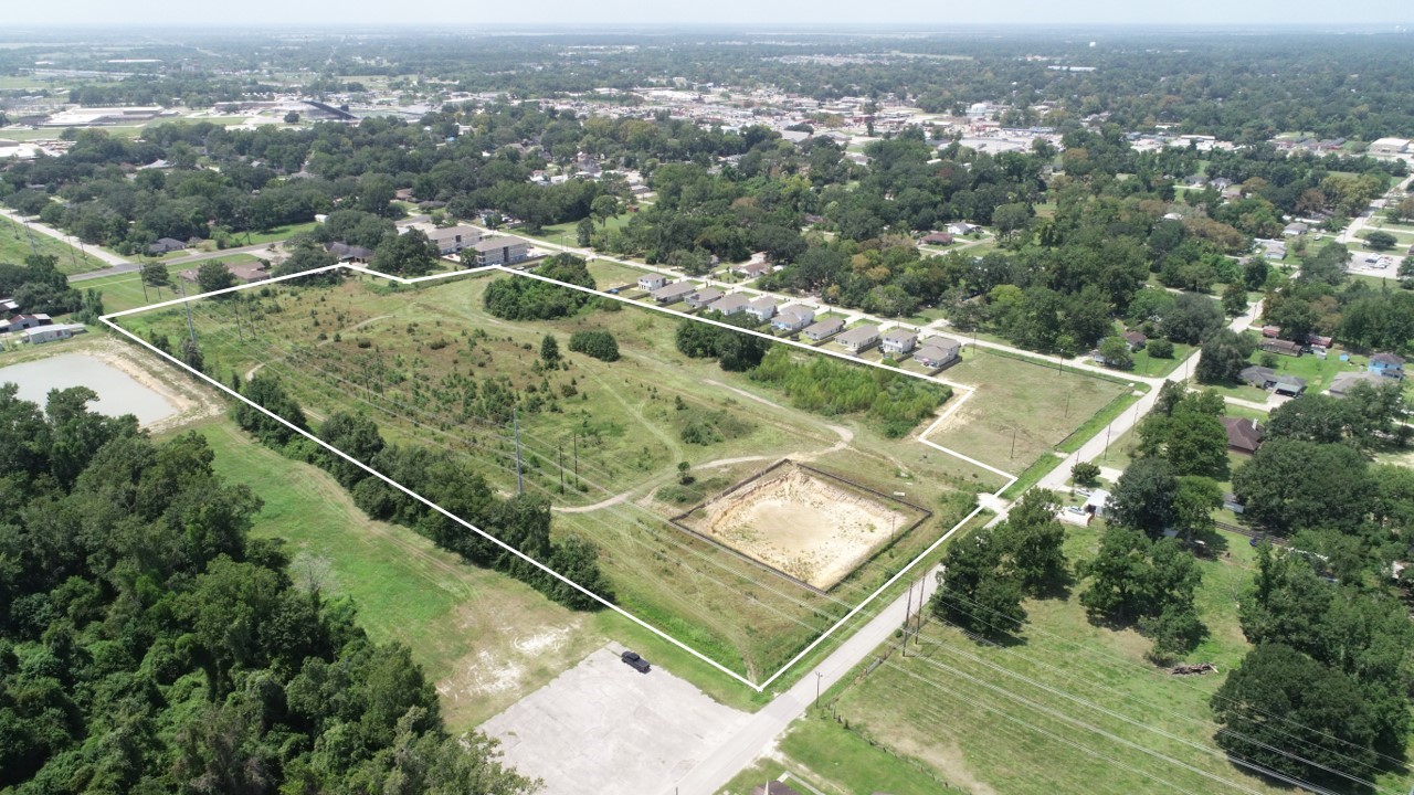 0 South Colbert Street Dayton, TX 77535 - Photo 3 of 4 an aerial view of residential houses with outdoor space