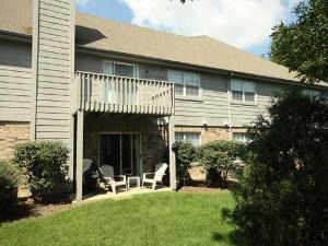 43 Foxcroft Road, Unit 103 Naperville, IL 60565 - Photo 15 of 18 a view of a house with a yard and sitting area