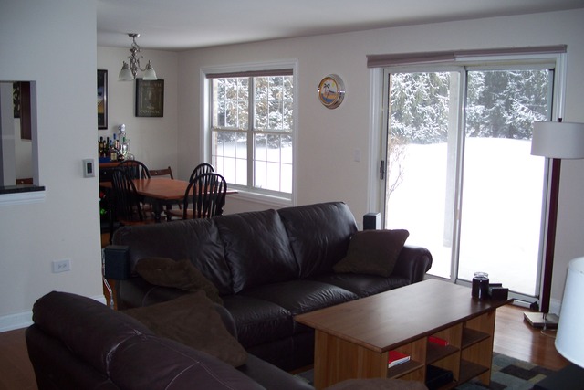 43 Foxcroft Road, Unit 103 Naperville, IL 60565 - Photo 8 of 18 a living room with furniture and a window