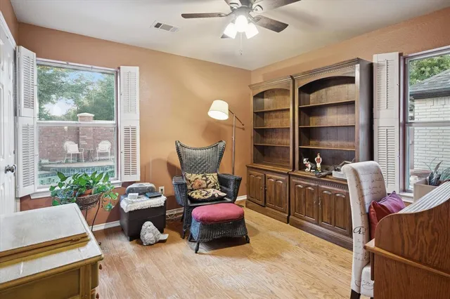 a living room with furniture and a window