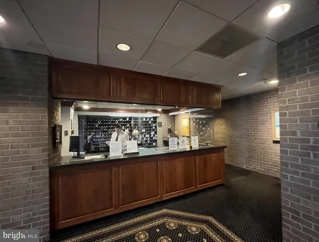 a view of lobby with mirror