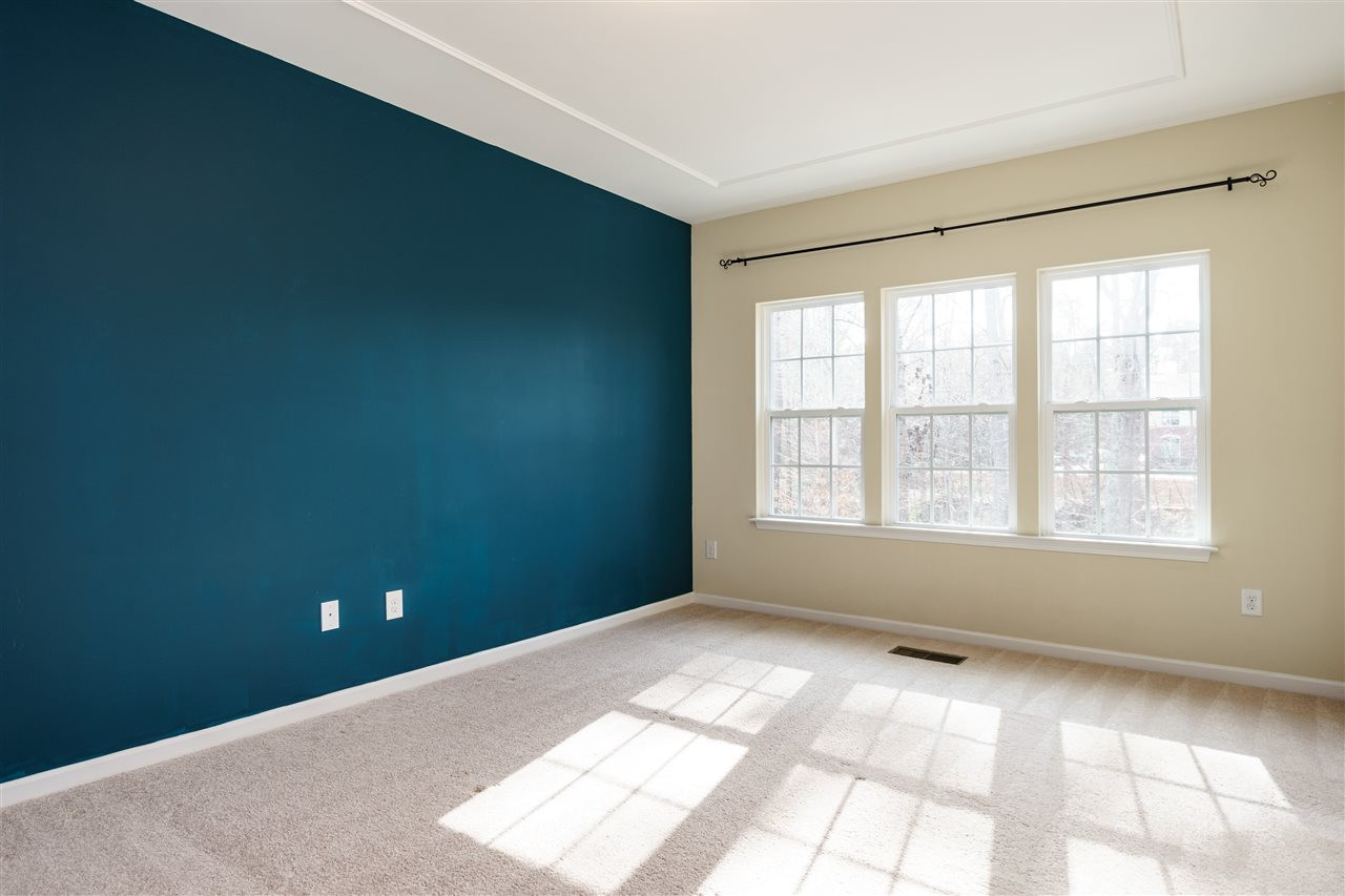 5635 Wade Park Boulevard Raleigh, NC 27607 - Photo 16 of 25 Enjoy this spacious master suite with tray ceiling. Huge walk in closet and connecting bathroom! Master Bedroom