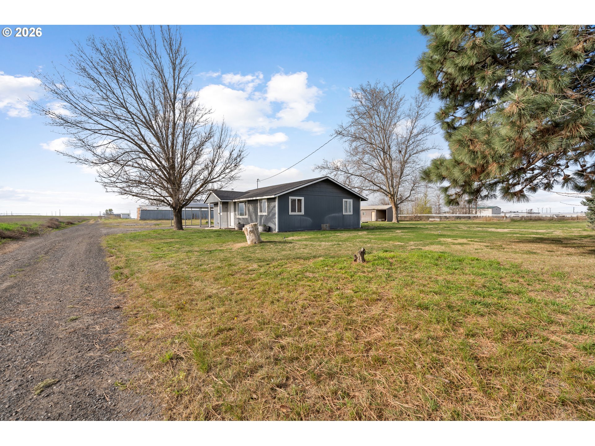 2130 Southeast 19th Street Hermiston, OR 97838 - Photo 23 of 32 a view of a house with a yard
