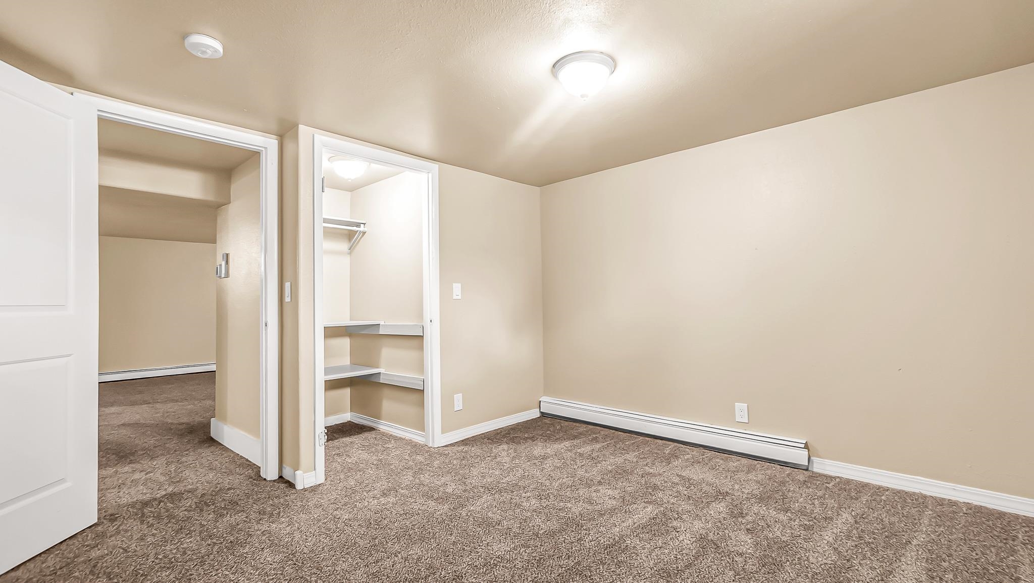 208 3rd Street Parachute, CO 81635 - Photo 26 of 40 an empty room with a empty space