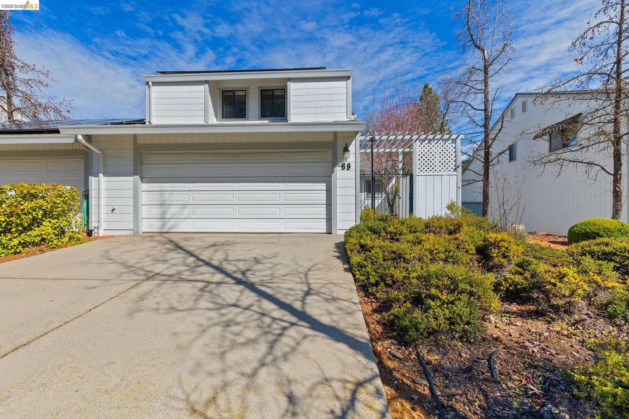 23686 Marble Quarry Road, Unit 69 Columbia, CA 95310 - Photo 1 of 1 a front view of a house with a yard