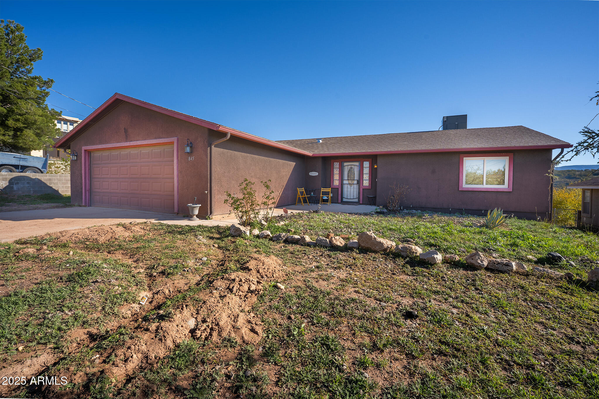 5845 North Bentley Drive Rimrock, AZ 86335 - Photo 2 of 35 a front view of house with yard and trees in the background