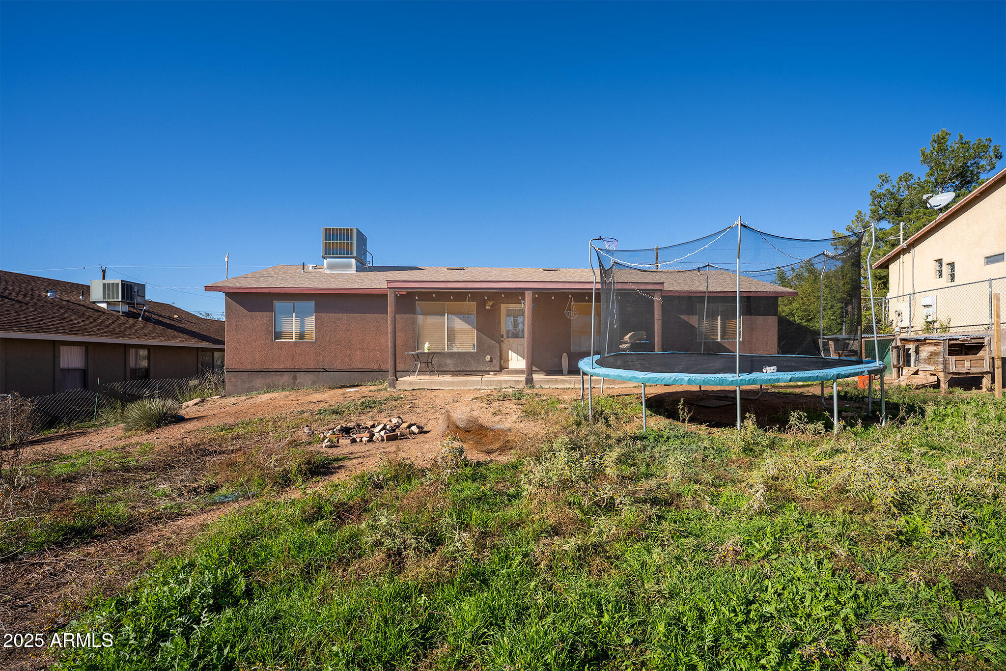 5845 North Bentley Drive Rimrock, AZ 86335 - Photo 26 of 35 a front view of a house with a garden