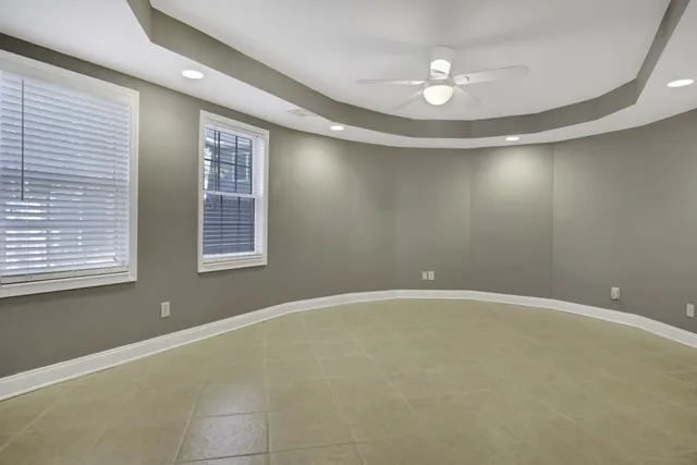 an empty room with windows