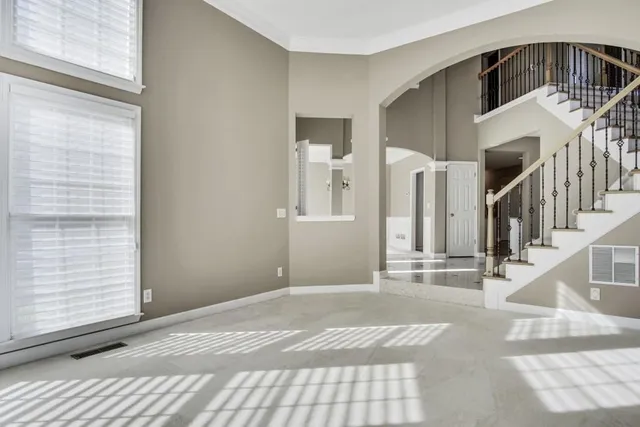 a view of a hallway with entryway