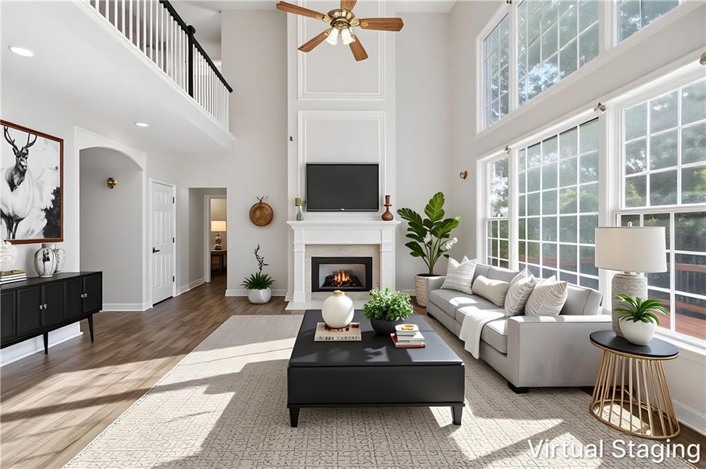 110 Mayes Farm Road Northwest Marietta, GA 30064 - Photo 16 of 49 a living room with furniture a fireplace and a flat screen tv