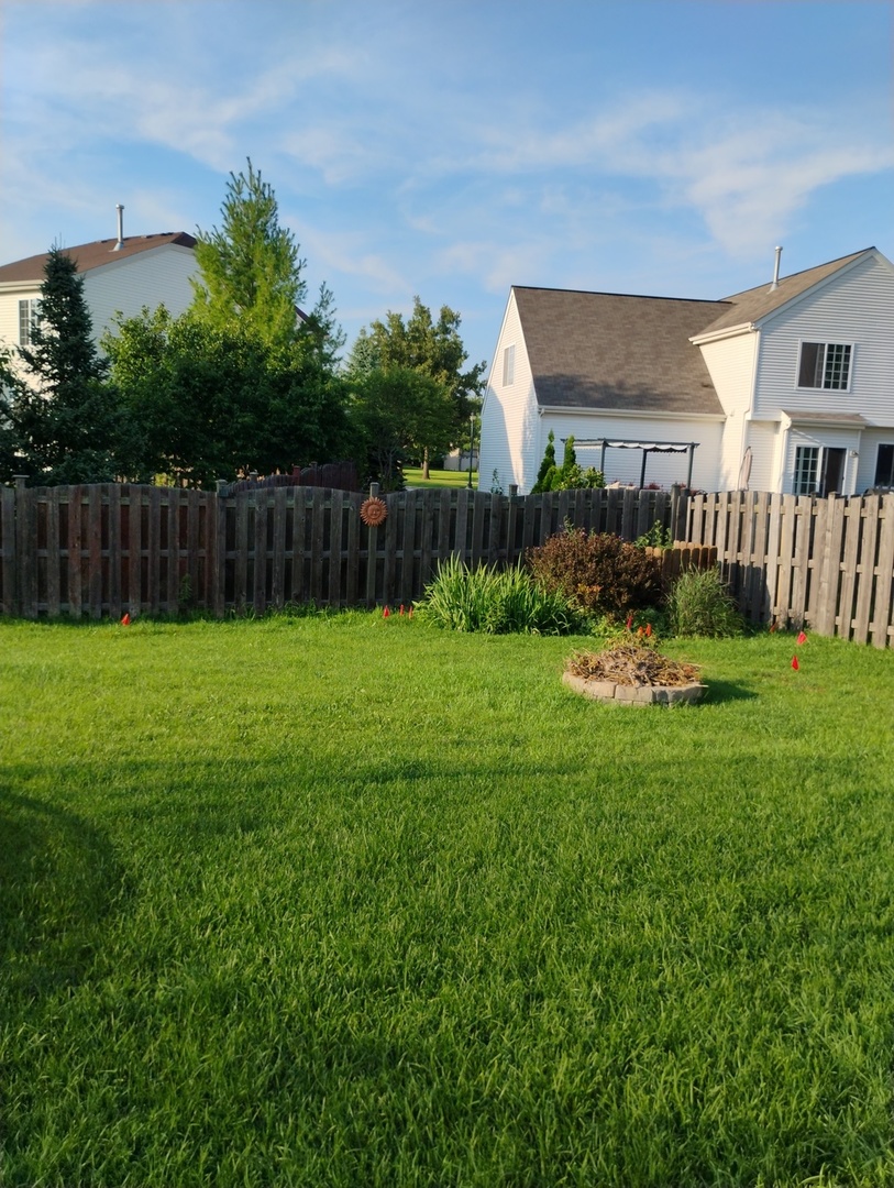 178 West Hampton Drive Round Lake, IL 60073 - Photo 37 of 55 a view of a yard in front of house