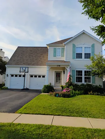 a view of a park with large trees