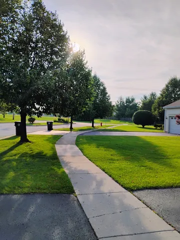 a view of a park with welcome board