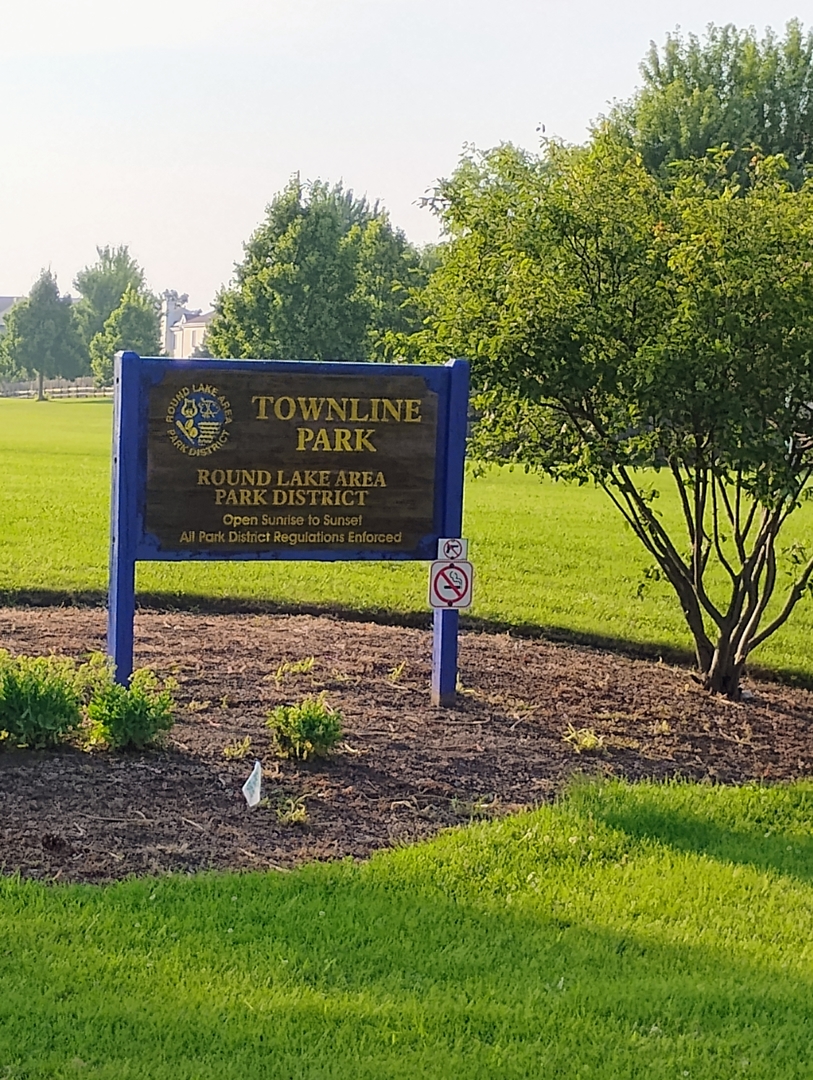 178 West Hampton Drive Round Lake, IL 60073 - Photo 54 of 55 a view of a park with welcome board